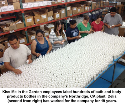 Kiss Me In the Garden employees label hundreds of bath and body products at the company's California plant